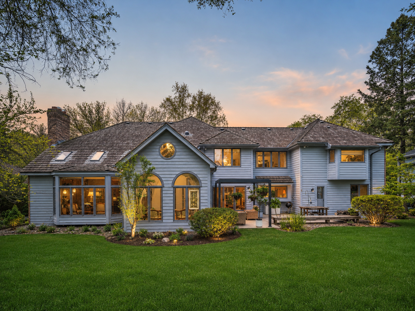 Light for Art — Rear Exterior at Dusk with Sunroom Glowing Warm